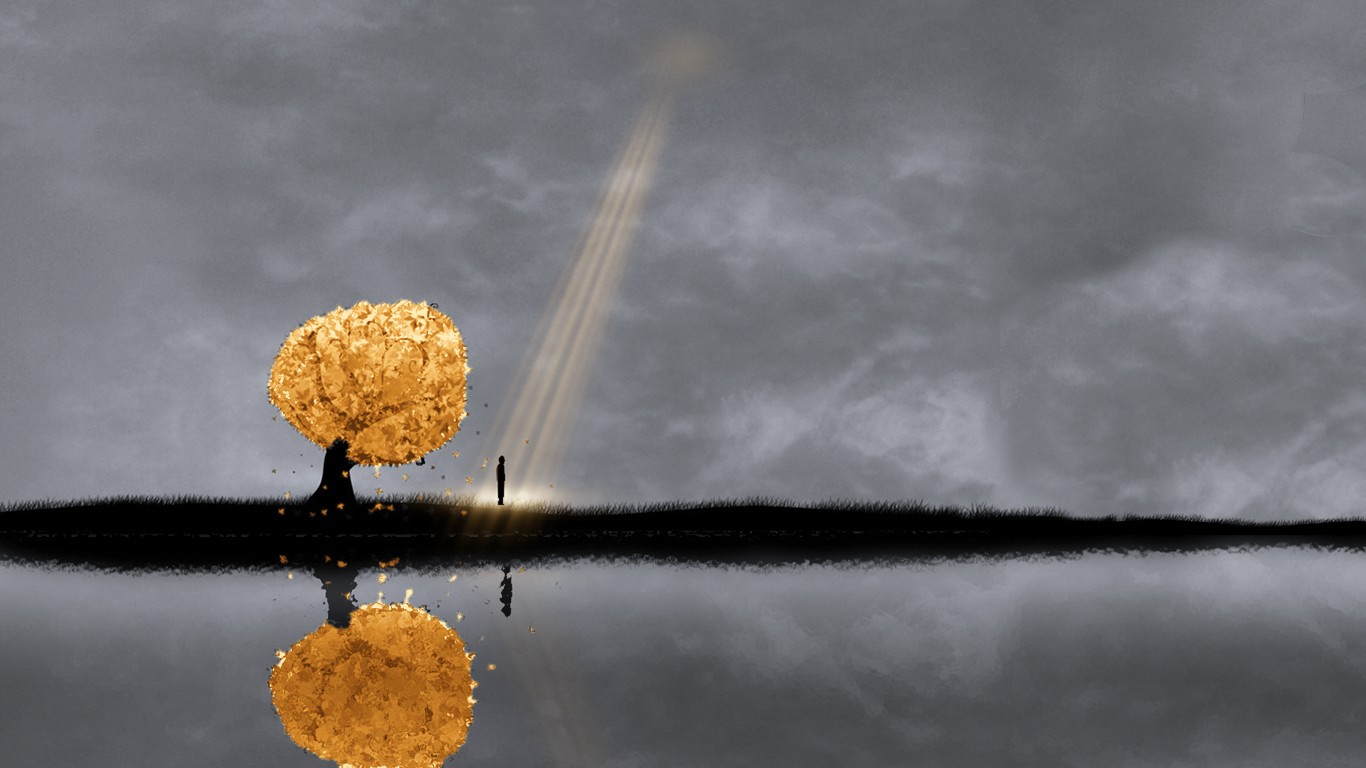 A lone figure stands beside a golden tree on a thin strip of land under a grey sky, with a shaft of golden light falling from a cloud onto him, mirrored in still water